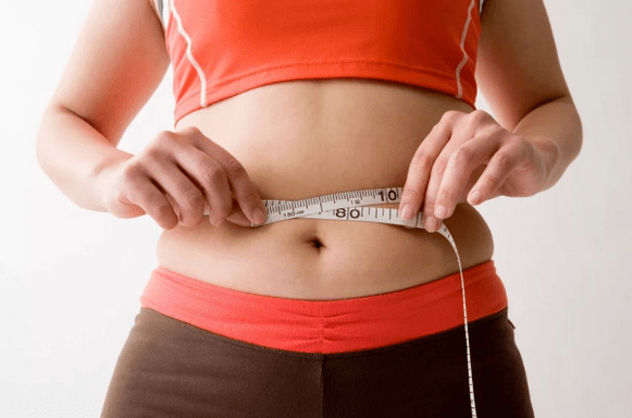 Girl measure waist volume