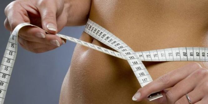 measuring your waist while losing pounds